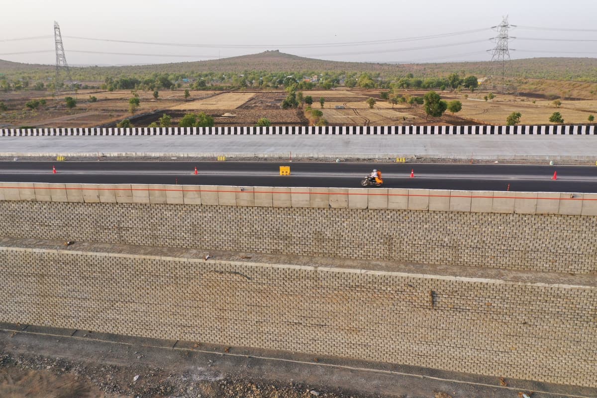 Applying a two-tiered reinforced soil system for a rail overbridge